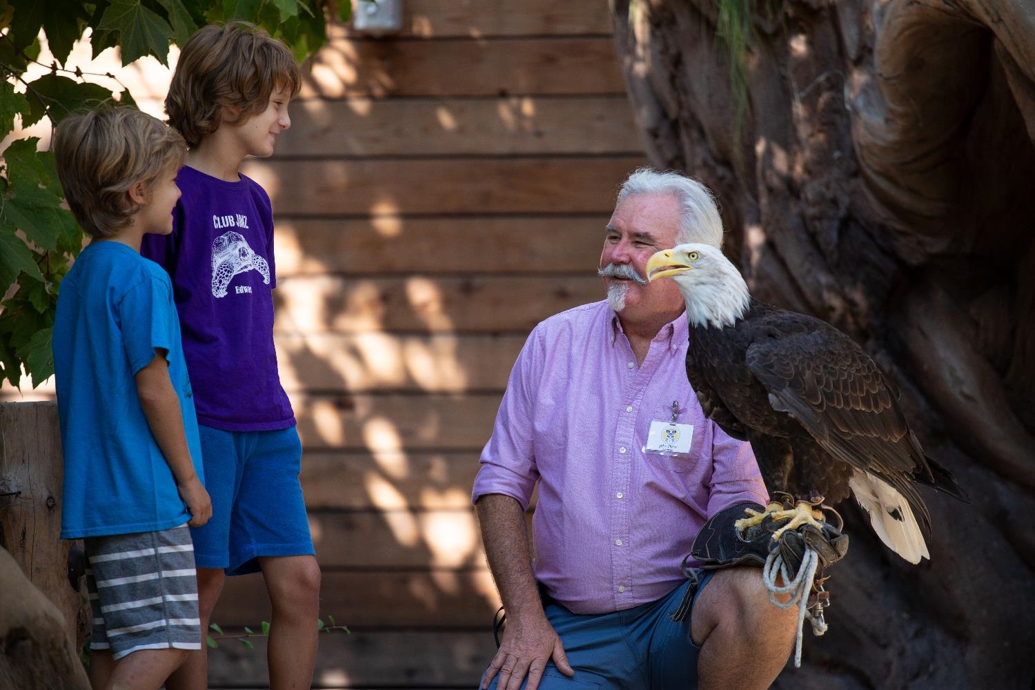 John Flynn Volunteers with His Favorite Avian Friend